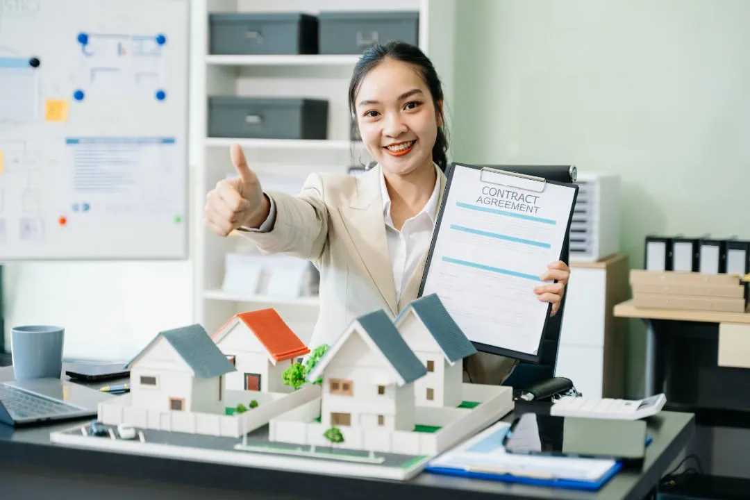 A happy real estate agent